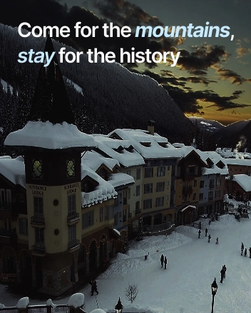 Snowy mountain village with Sundance Lodge buildings and “Come for the mountains, stay for the history” headline