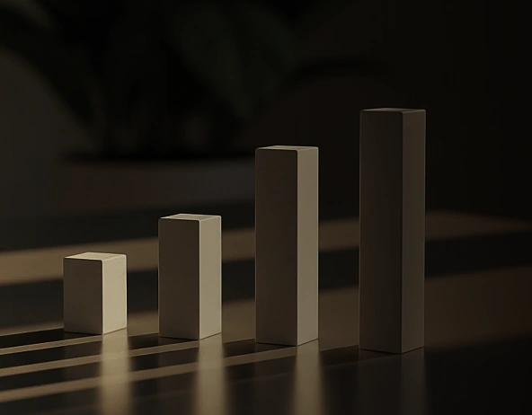 Minimal bar chart with increasing columns representing growth and progress
