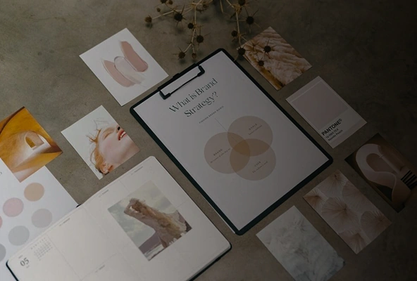 Brand moodboard with color palette, visuals, and strategy layout on clipboard